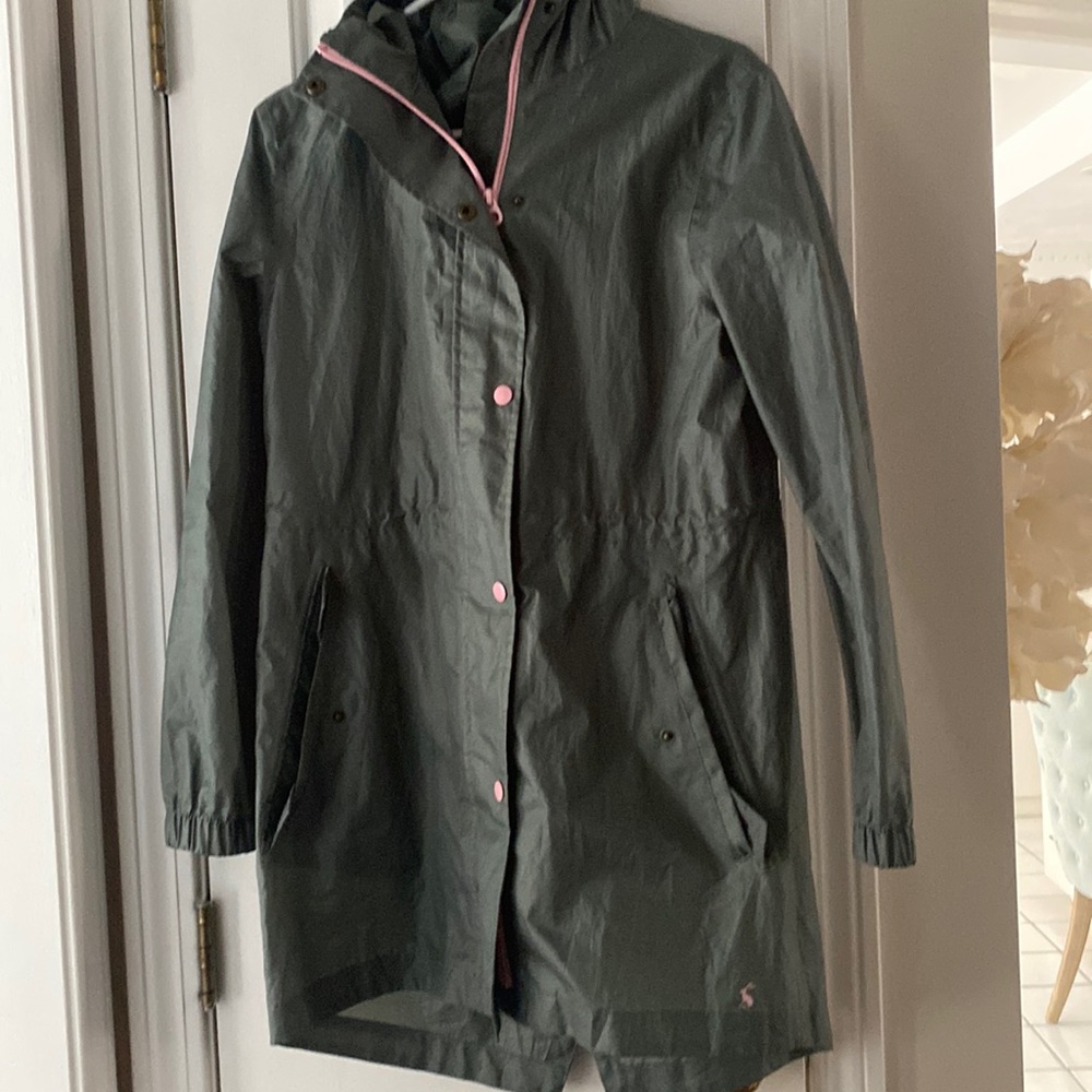 Lightweight green and pink raincoat